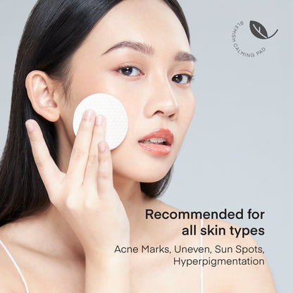Asian woman applying a Terez &amp; Honor Blemish Calming Pad to her face, highlighting the product&